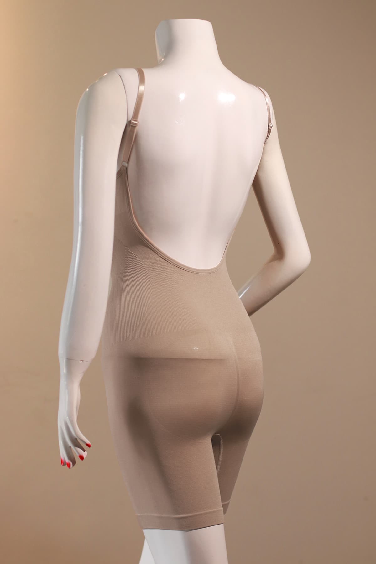 Back view showing the low-back design of the nude corset body shaper