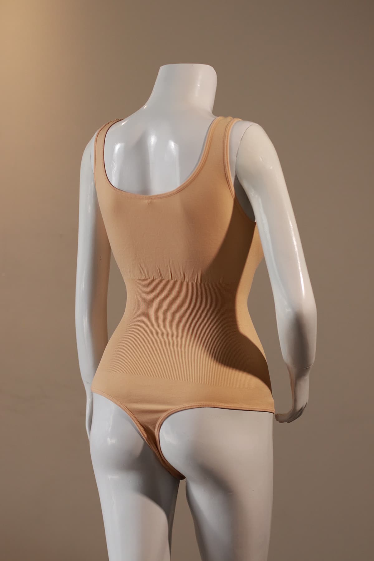 Nude open crotch shaper back view